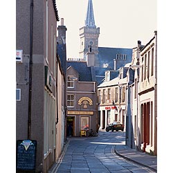 Victoria Street - Argos baker shop town main street church spire  photo 