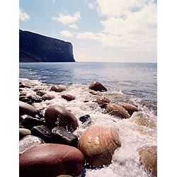 Rackwick - Sea waves splashing onto stoney boulder rocks on beach bay and Craig Gate  photo 