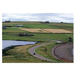 Echna Loch - Car on road by Echna Loch travelling countryside  photo 