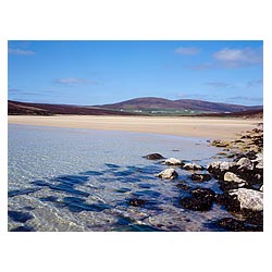 Waulkmill Bay - Shore rocks sandy beach seaweed sea and bay tranquil clear blue sky coast  photo 