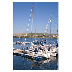 Marina - Yachts leisure craft boats berthed at quayside jetties  photo 