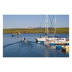 Marina - Motor boat leaving marina jetties yachts fishing boat  photo 