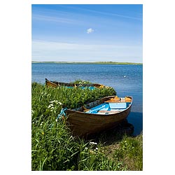 Loch of Harray - Anglers fishing boat on shore  photo 