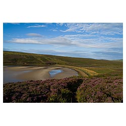 Waulkmill Bay - Footpath through purple heather down to sandy bay  photo 