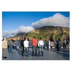 Kame of Hoy - Passengers on board MV Hamnavoe car ferry looking at seacliffs  photo 