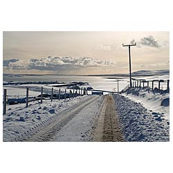 Quholm - Icy snow roads views Scapa Flow empty road countrylane winter slush  photo 