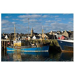 Stromness harbour - Fishing boat alongside quay Stromness harbour pier  photo 