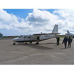 Kirkwall airport - boarding loganair britten-norman bn2b-26 islander aeroplane people plane  photo 