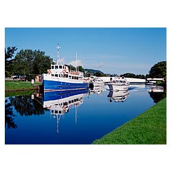 Caledonian Canal - Tomnahurich Bridge lock gate Loch Ness tourist motor boat in Scotland uk  photo 