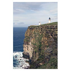 Dunnet Head Lighthouse - Seacliffs light tower beacon building overlooking Pentland Firth scotland  photo
 