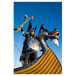 Up Helly Aa procession - Guizer Jarl Einar of Gullberuvik and Viking longship galley Moogi prow man  photo 