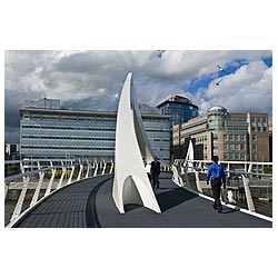 Broomielaw Tradeston bridge - Pedestrain walking over modern bridges scottish architecture squiggly  photo
 