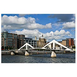 Broomielaw Tradeston bridge - Squiggly Bridge city centre buildings on waterfront skyline Scotland  photo
 